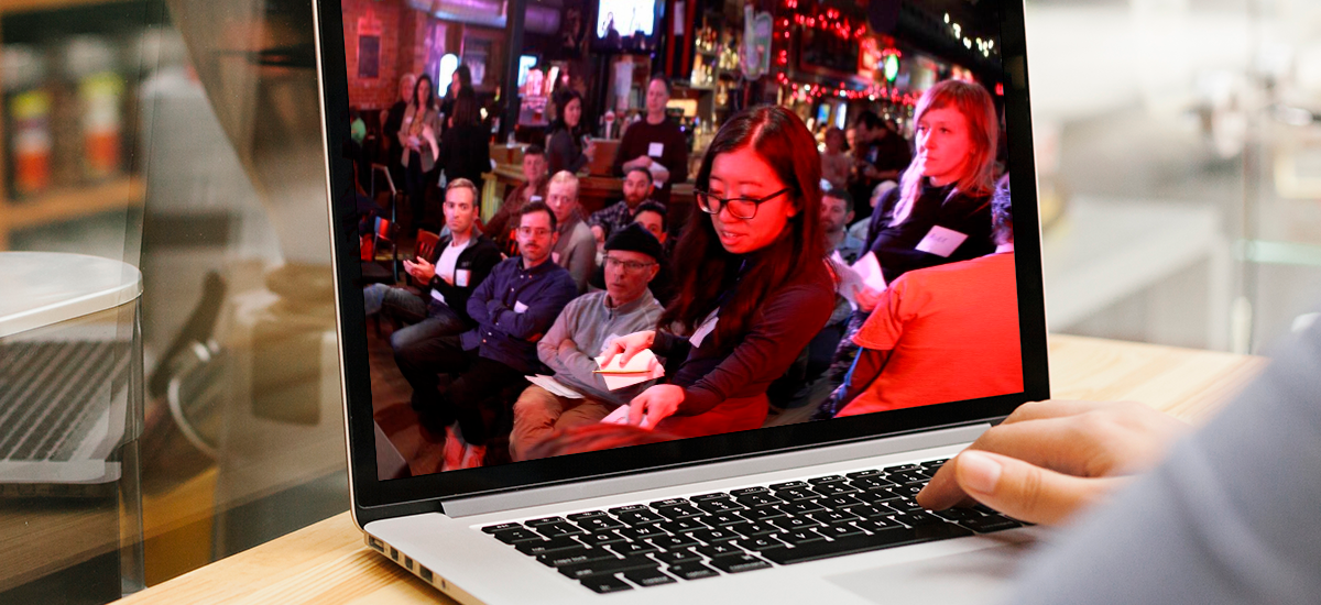 A meeting is being displayed on a laptop