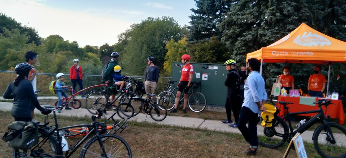 People on bikes meet up for a ride