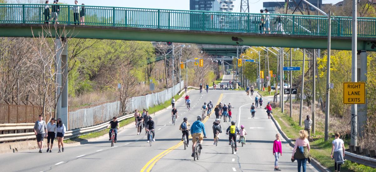 People walk and cycle on Bayview St