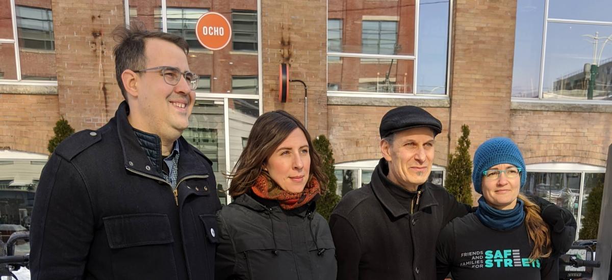 Road safety advocates pose in the cold