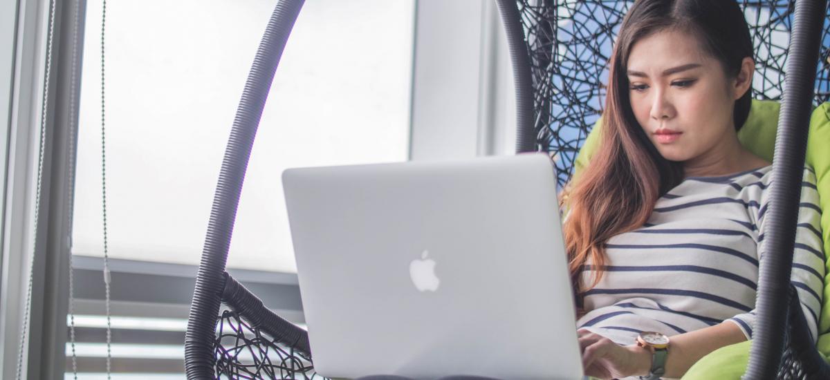 Person working on a laptop at home