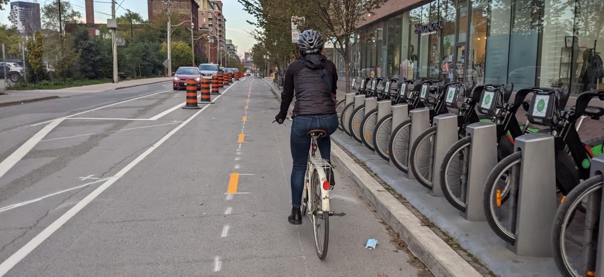 Woman rides a bike in a newly installed bike lane