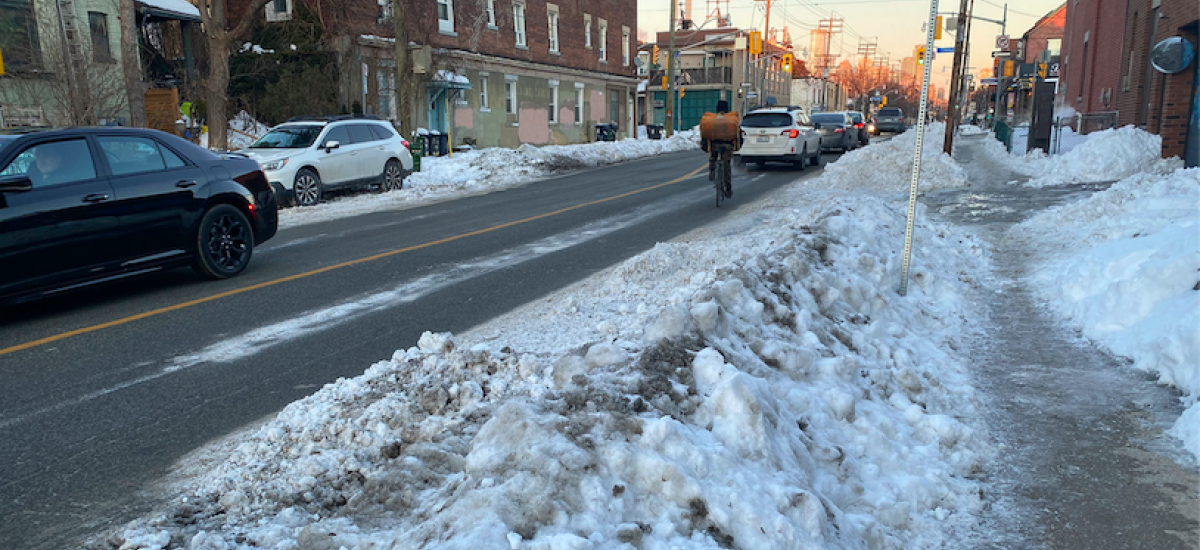 Harbord bike lane in Toronto covered in Snow