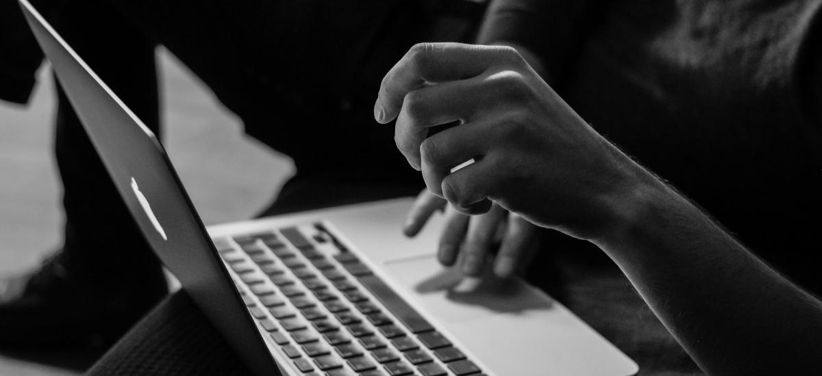 Photo of person working at their computer by Sergey Zolkin