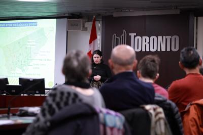 Advocacy Forum Graphic that features the CN Tower and a woman at a podium