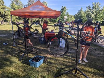 People work on bikes