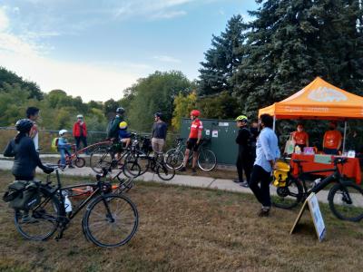 People on bikes meet up for a ride