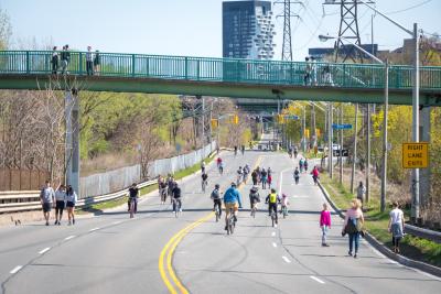 People walk and cycle on Bayview St