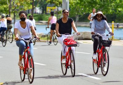 Bike Riders On Lake Shore