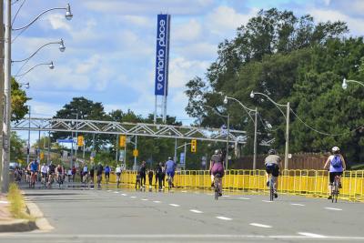 Lake Shore Boulevard West at Ontario Place is open with many people riding bikes on it.