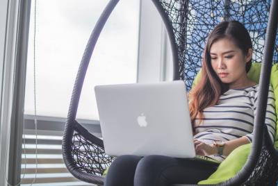 Person working on a laptop at home