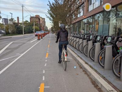 Woman rides a bike in a newly installed bike lane