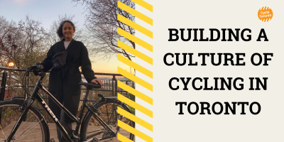 Sonam stands beside her bike as the sun sets over Lake Ontario