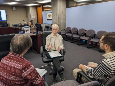 Participants of our first workshop sit in chairs and discuss