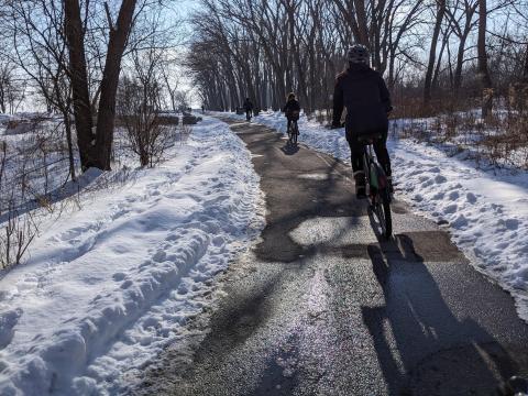 Group of cyclists enjoying winter riding