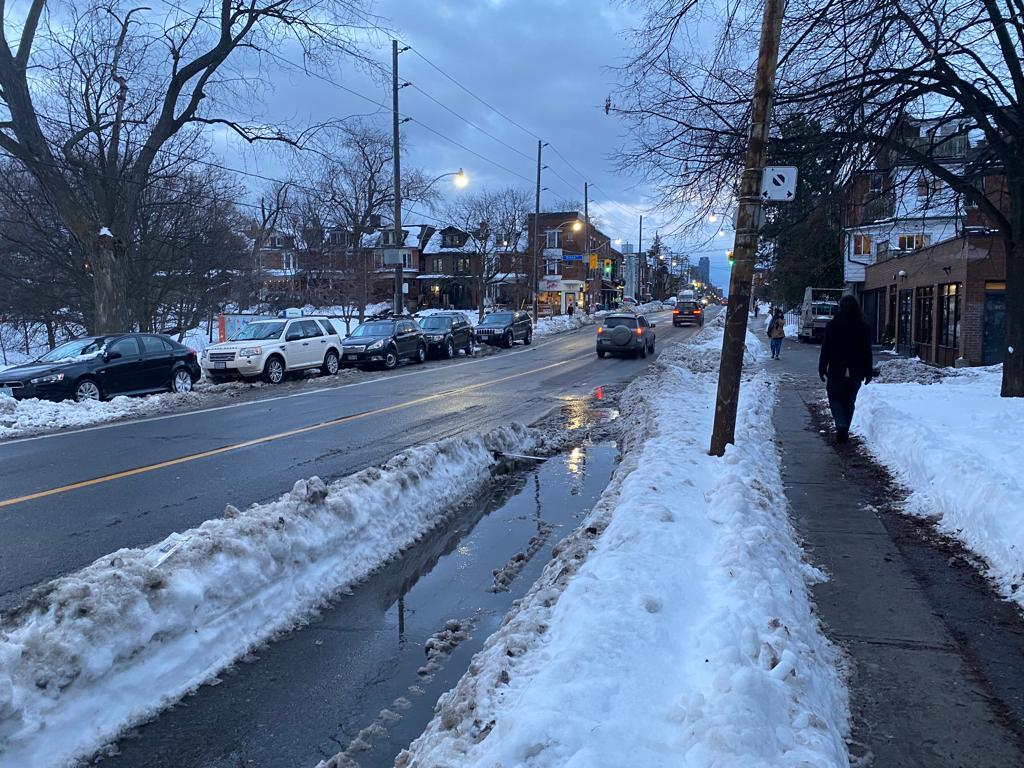 Harbord bike lane in Toronto covered in Snow