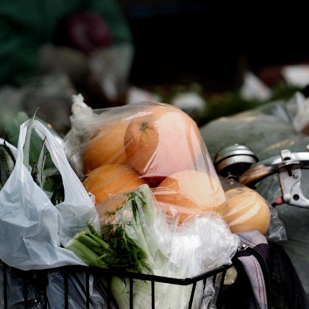 Groceries in a bike basket.