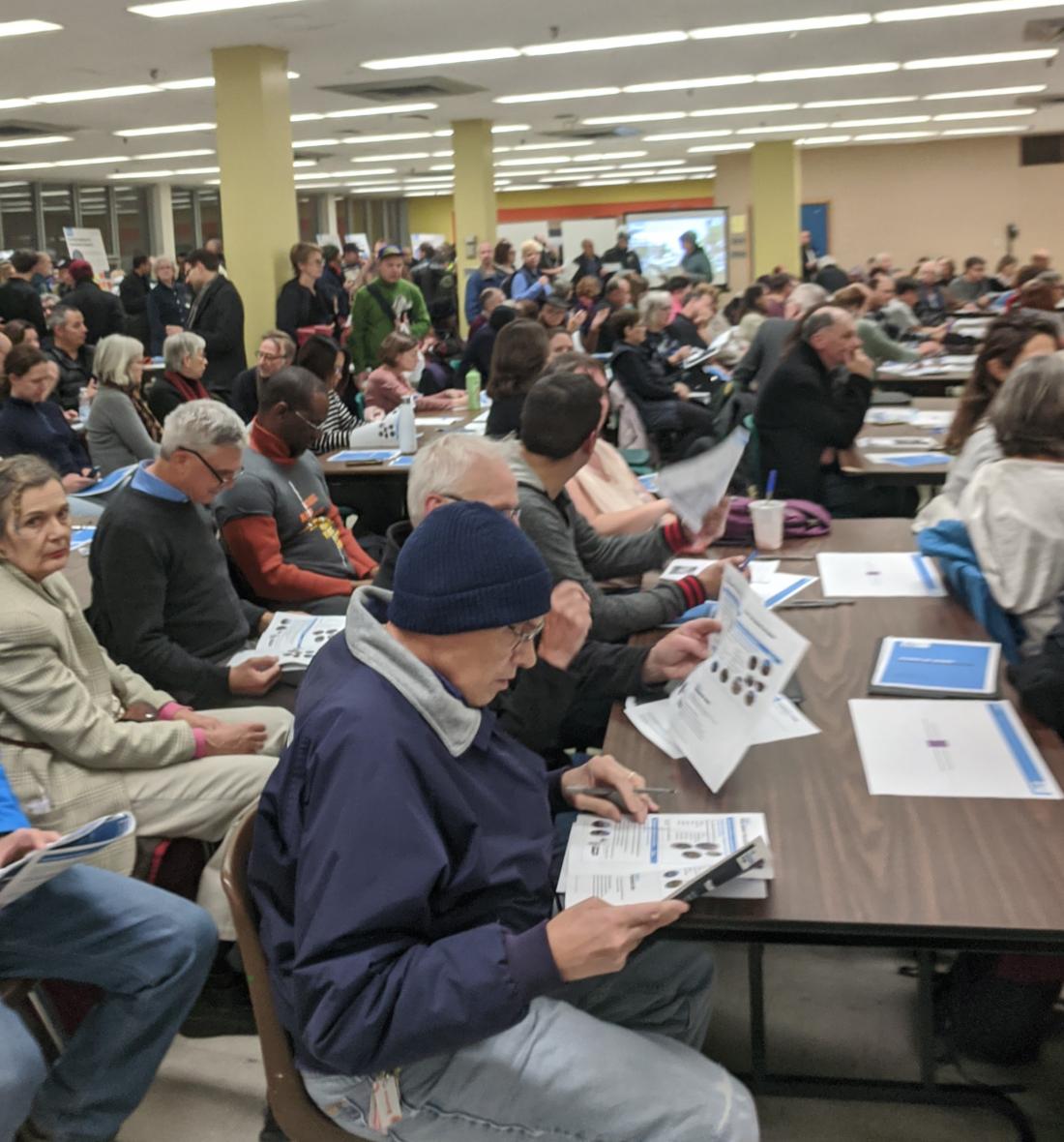 Packed room waits for the Danforth Public Consultation to start