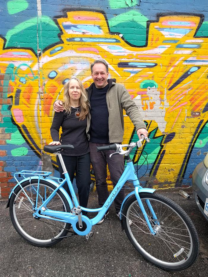 Lorraine and Travis with Travis' new bike outside Urbane Cyclist Lorraine and Travis with Travis' new bike outside Urbane Cyclist