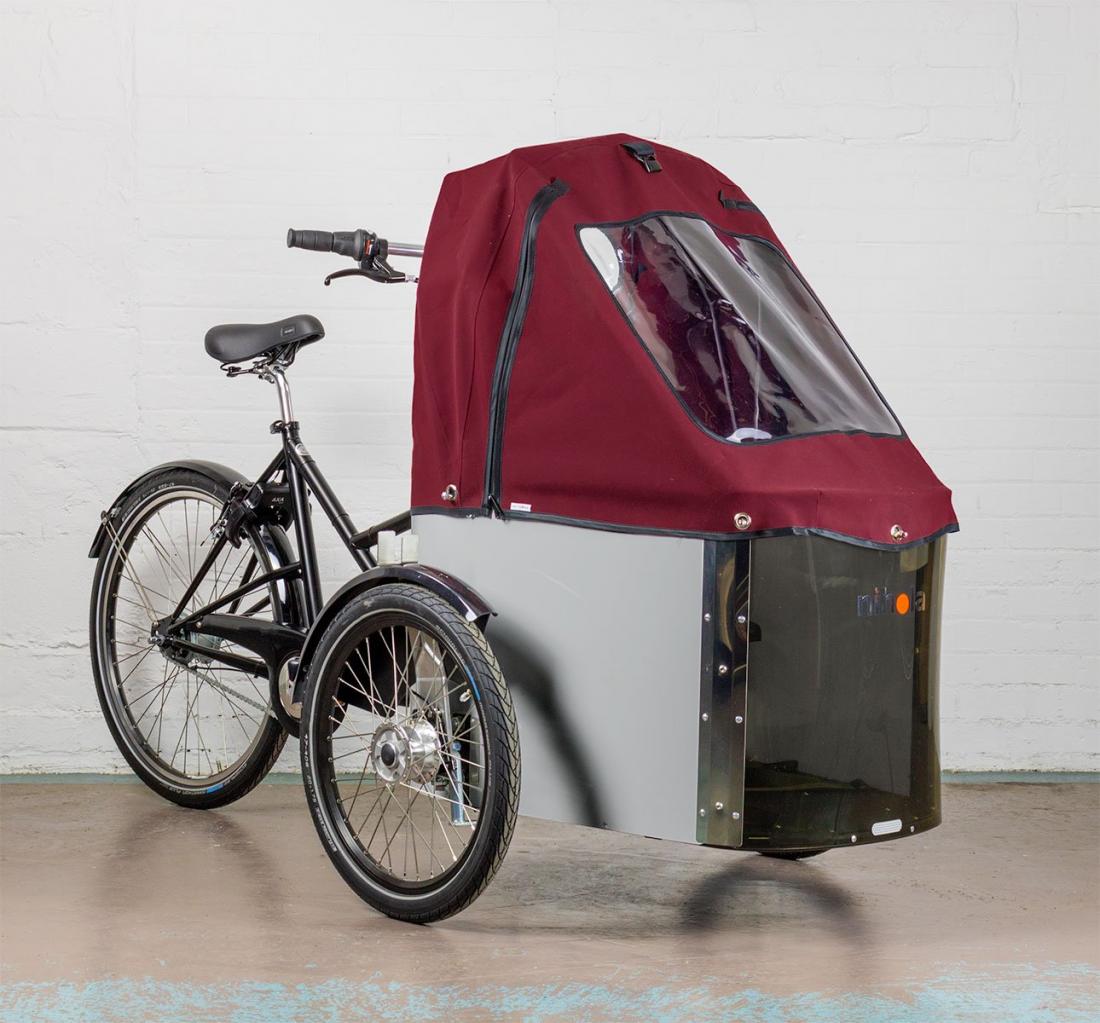 E assists cargo tricycle with covered storage area in front