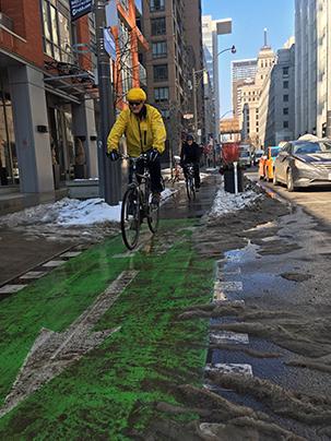 Cycling on the Simcoe St protected bike lanes