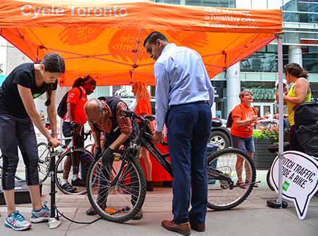 busy bike month commuter station outside mec