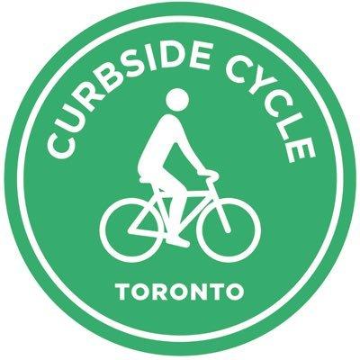 Green circle with a white outline of a person biking inside